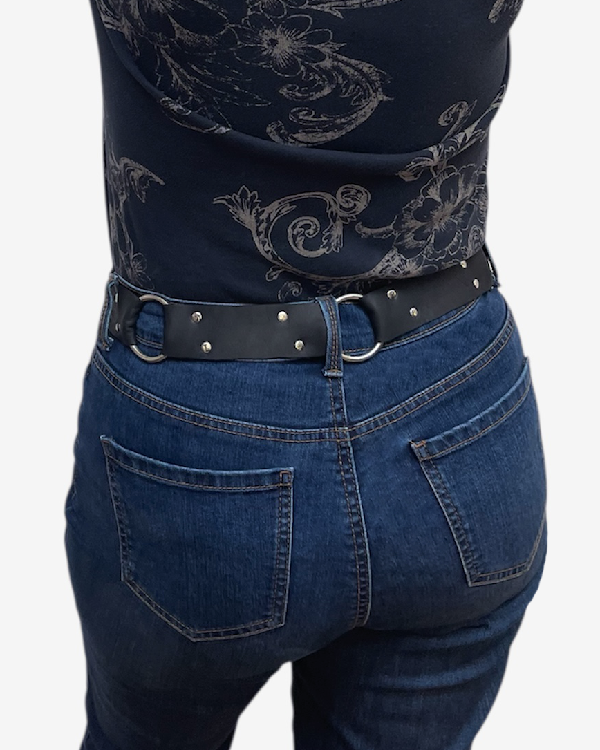 Black leather belt with silver rings and rivets