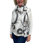 Black hand painted, rectangle off white silk scarf.